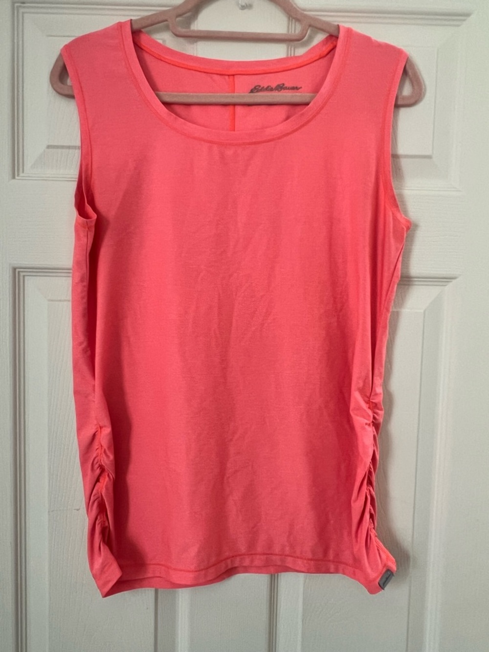 Eddie Bauer women's coral pink athletic tank top with side ruching.